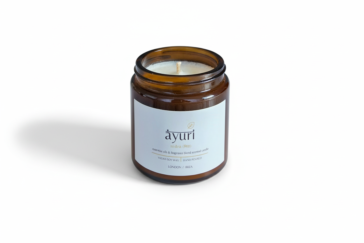 scented candle in apothecary glass jar