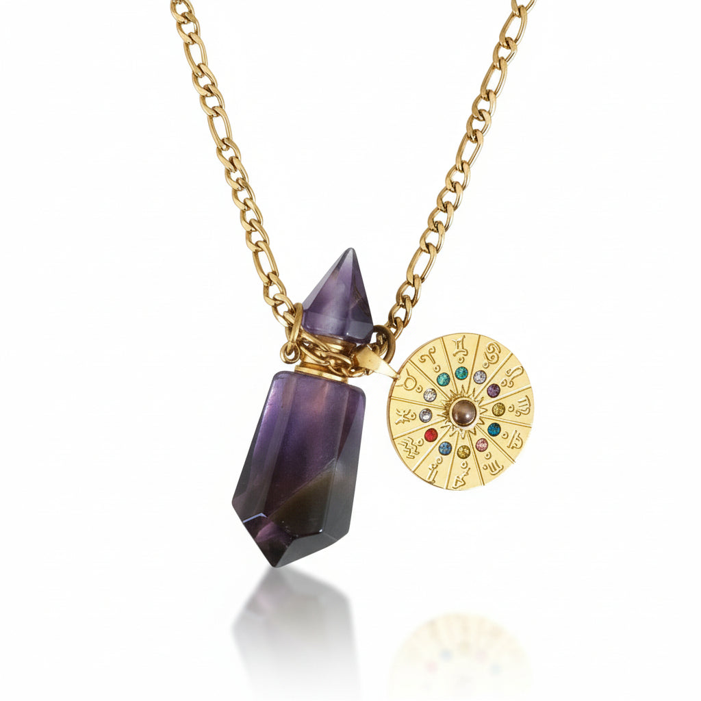 zodiac clock Necklace with an amethyst crystal pendant bottle for perfume oil and gold chain on a white bust against a wooden background