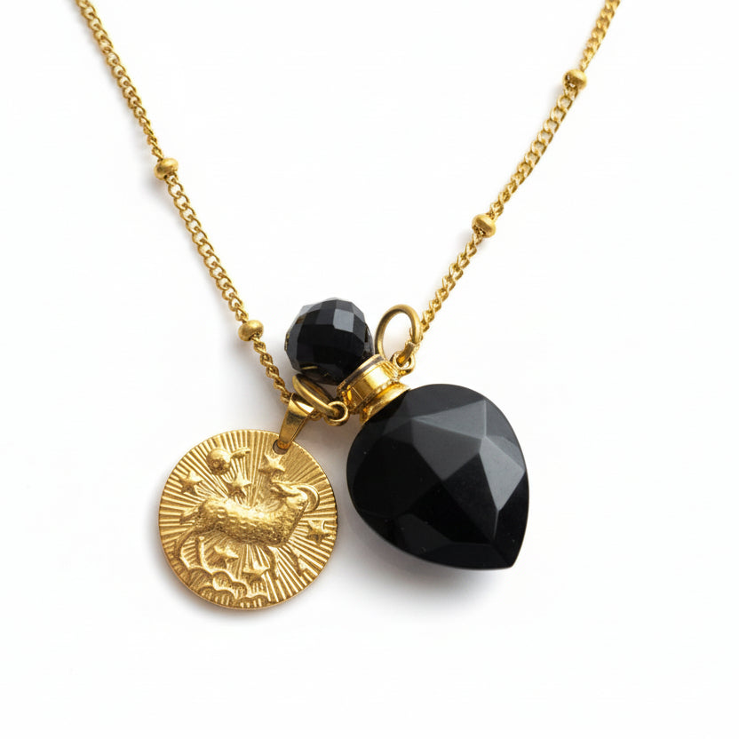 Aries zodiac necklace with black obsidian crystal pendant bottle